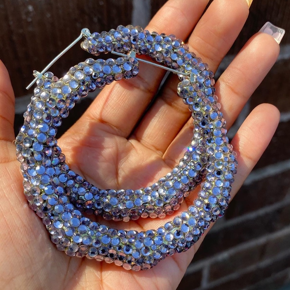 Lavender bedazzled bamboo hoop earring. About 3in across